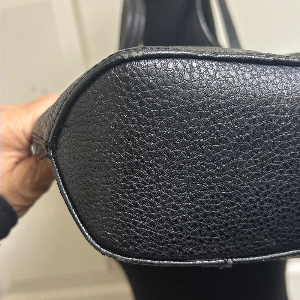 Anne Klein Black leather Tote with size pocket and adjustable straps. 13”x9 1/2”
